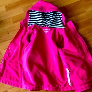 Girls pink rain coat.